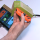 Did you know that that black sensor at the bottom of the right Joy-Con can act as a night-vision camera and beam a feed of what it’s pointed at to the Switch’s screen? That’s what is happening in this shot. That’s me in that green box in the screen. A tap of that box on the Swtich screen switches the camera view to a heat-sensor mode, which sets the whole thing up to then track and follow heat signals. See that in action in the Labo RC Car video elsewhere in this post.